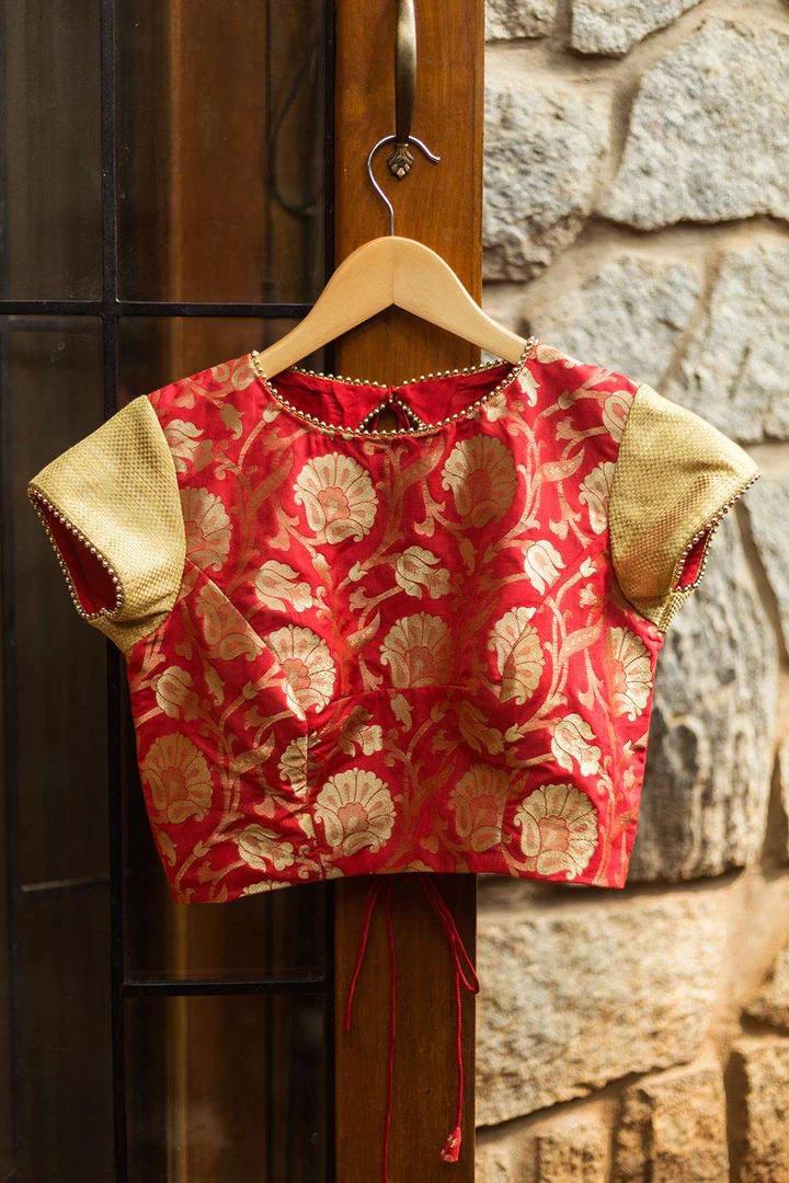 Red brocade closed neck blouse with gold brocade sleeves 1